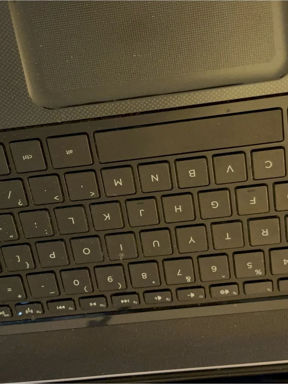 HP Black Laptop with Glossy Black Bezel and Matte Black Keyboard